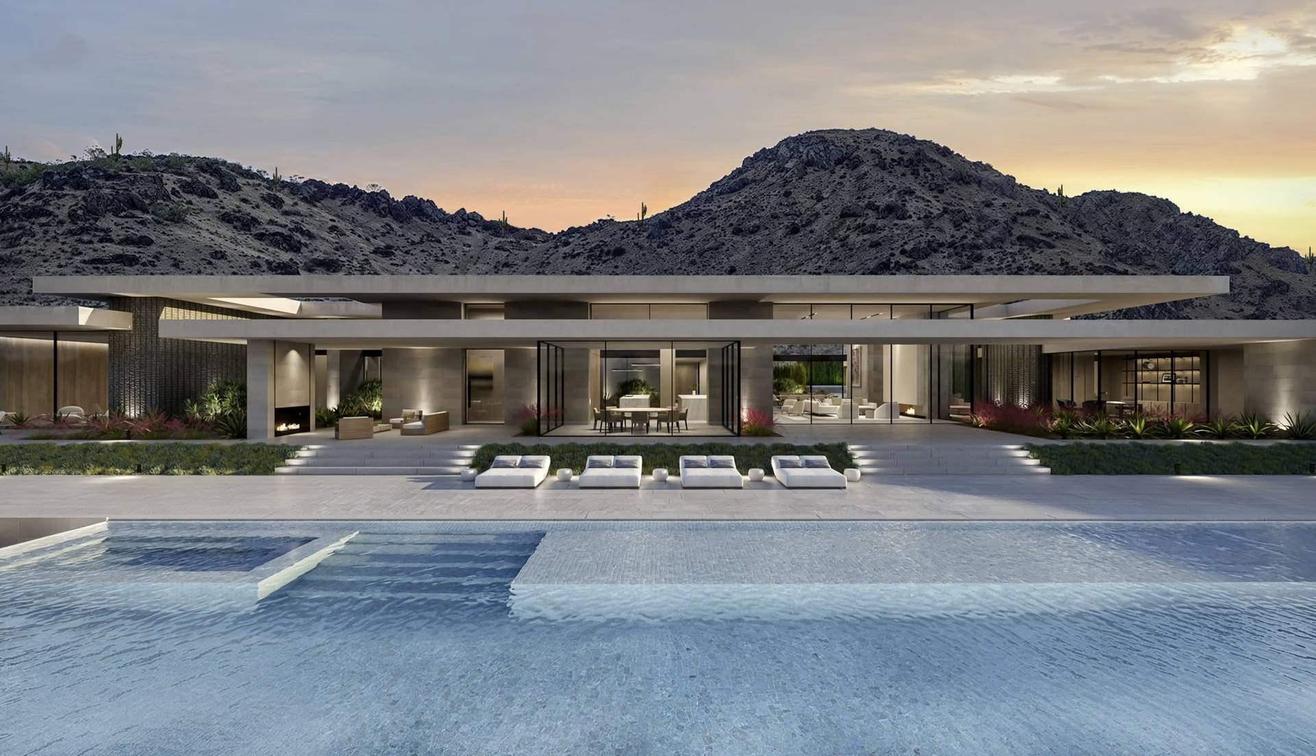 The Otium, Paradise Valley luxury estate — the pool terrace at sunset beneath Mummy Mountain