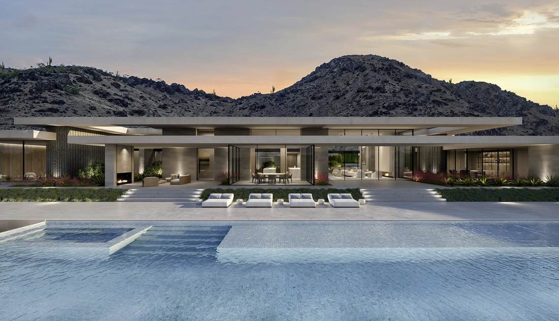 The Otium, Paradise Valley luxury estate — the pool terrace at sunset beneath Mummy Mountain